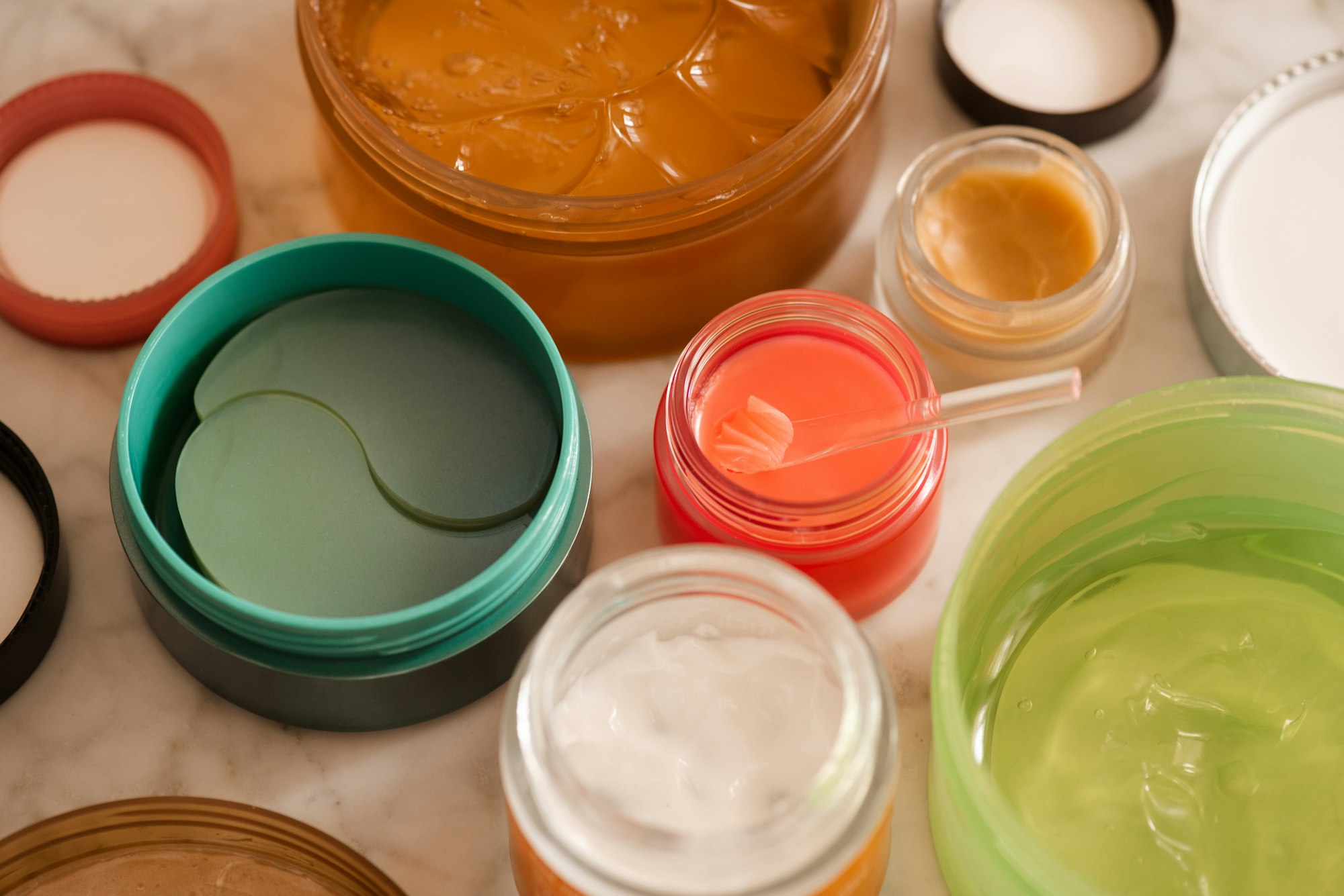 Skin care products on bathroom table close up